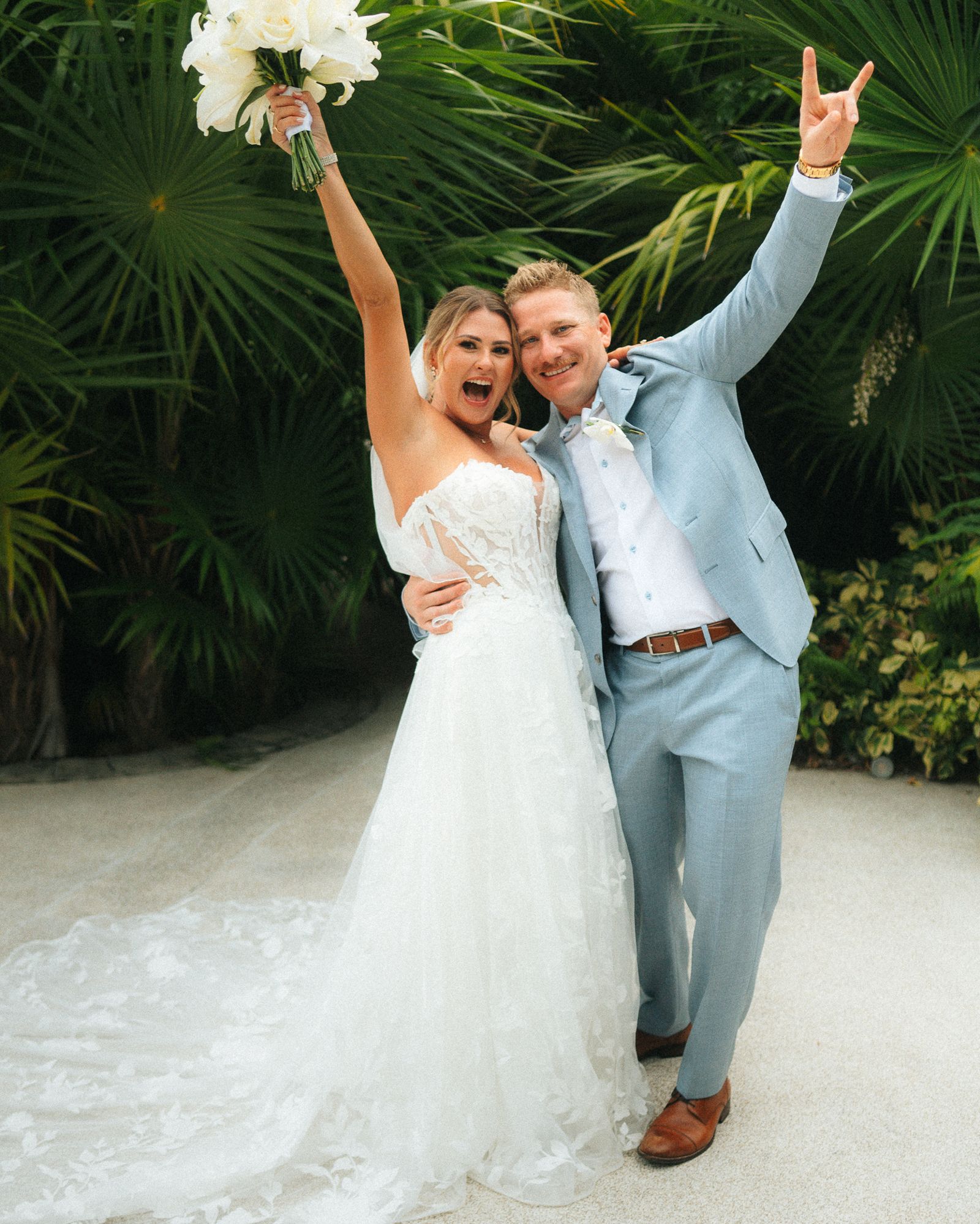 Palms, a bouquet in the air and pure celebration.